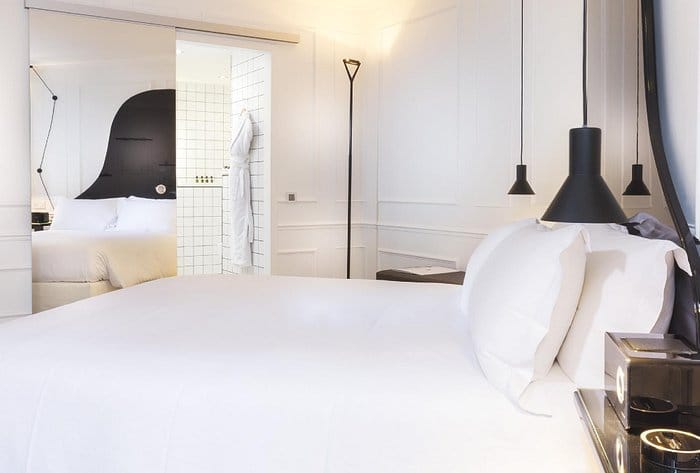 Contemporary luxury VIP suite at La Maison Champs Elysées for upscale event accommodations.