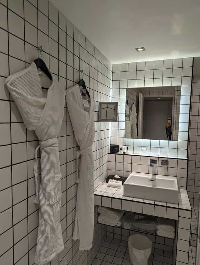 Luxury hotel bathroom suite, La Maison Champs Elysées, event accommodation, VIP room block.