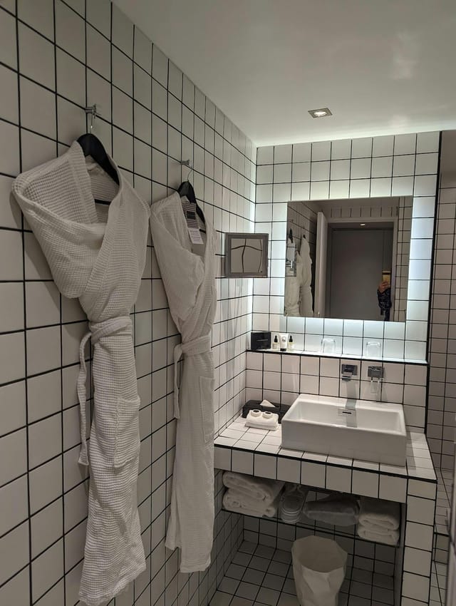 Luxury hotel bathroom suite, La Maison Champs Elysées, event accommodation, VIP room block.