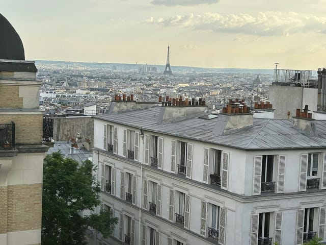 Parisian rooftop venue with Eiffel Tower view for executive receptions and incentive travel.