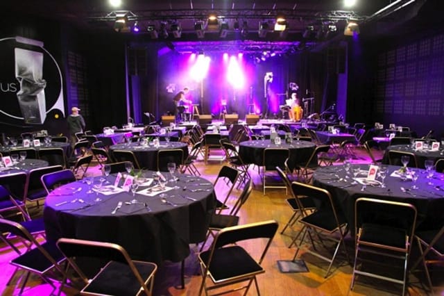 Gala setup at Pan Piper with theatrical lighting, ideal for corporate events and luxury dinners.