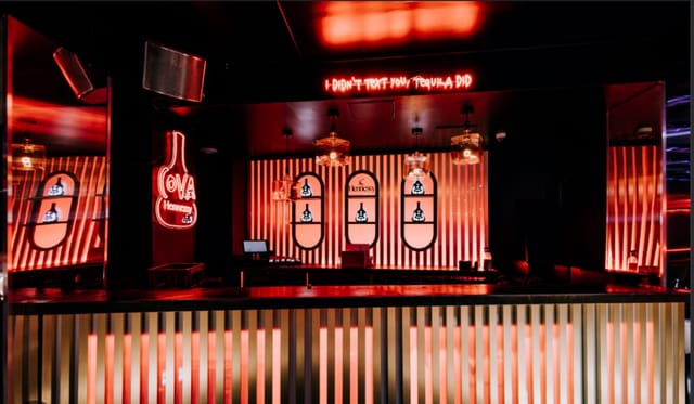 Mood-lit bar at Cova Backdoor Paris, ideal for evening reception and after-party events.