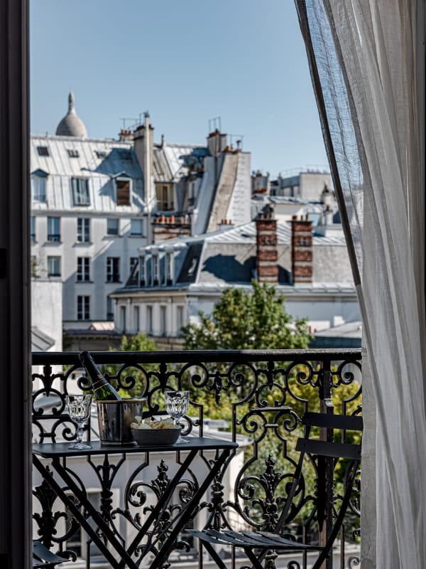 Parisian balcony suite at Grand Pigalle Experimental for luxury incentive travel and VIP networking.
