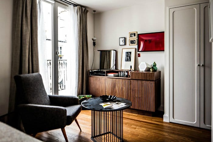 Private meeting room in Le Pigalle with residential decor for executive business networking.
