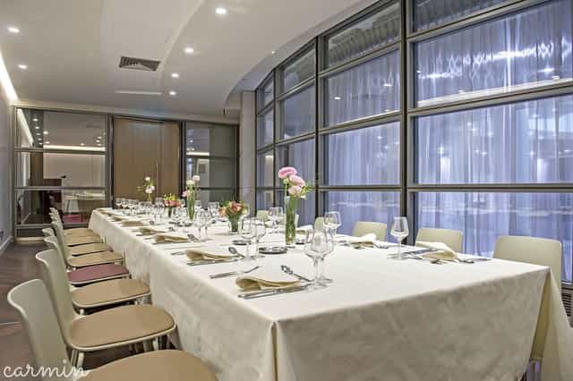 Boardroom at Etoile Saint-Honoré featuring natural light for corporate dinners and executive meetings.