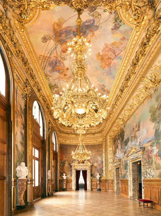 Ornate, gilded Opéra Comique theater: luxury venue for gala and VIP event hosting.