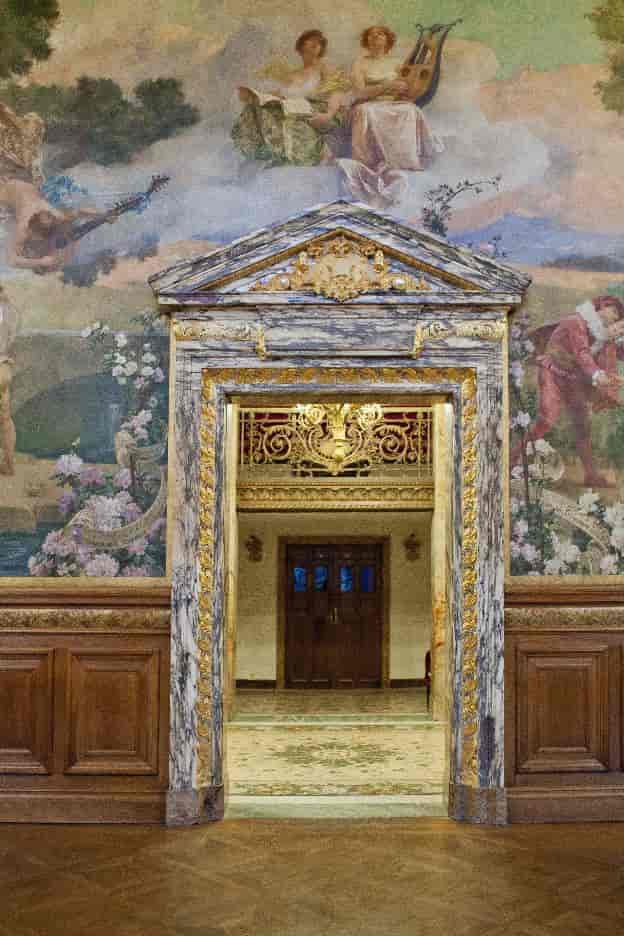 Opéra Comique foyer with historic murals, perfect for upscale gala and VIP reception event venues.
