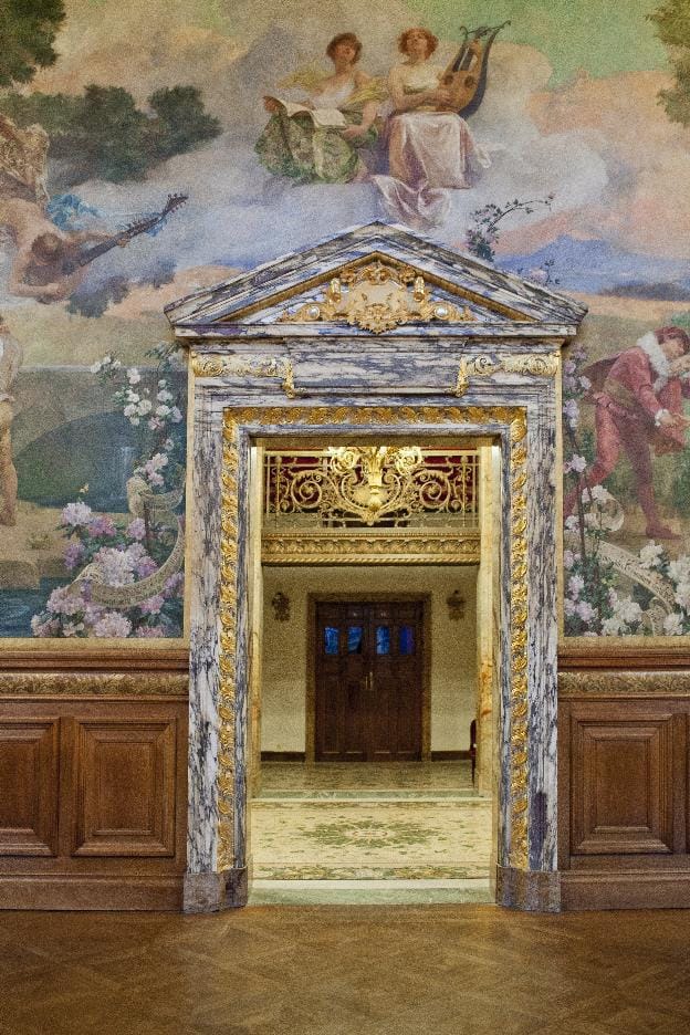 Opéra Comique foyer with historic murals, perfect for upscale gala and VIP reception event venues.