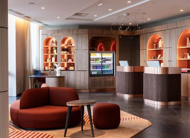 Modern hotel reception area at La Verrière, perfect for corporate networking and event hosting.
