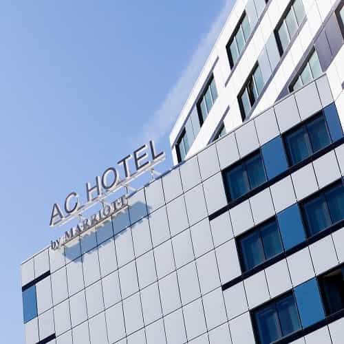 Modern AC Hotel Paris Porte Maillot room for corporate meetings and boutique events.