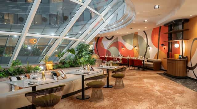 Modern cocktail bar with organic design for networking events and private dining receptions.