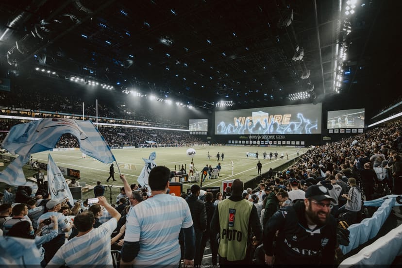 Racing 92 stadium in Paris La Défense Arena featuring immersive digital screens for live events.
