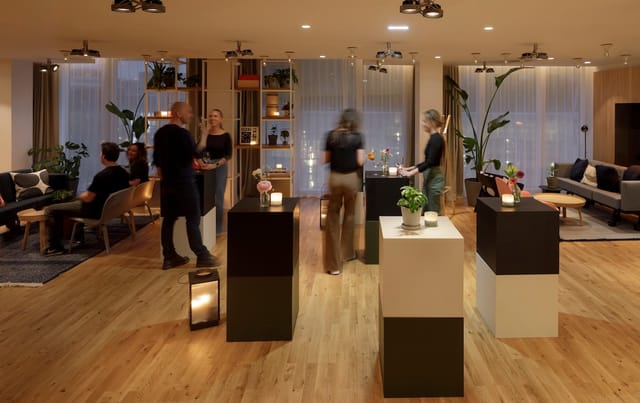 MeetingLoft networking reception with high-top tables at Zoku Paris for corporate events.