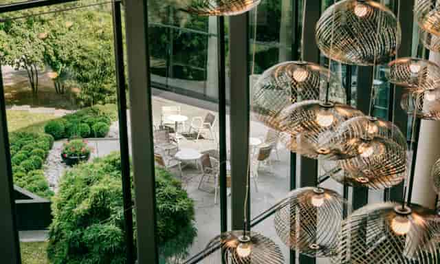 Patio at Pullman Paris Centre-Bercy with floor-to-ceiling windows for networking and events.