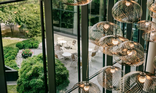 Patio at Pullman Paris Centre-Bercy with floor-to-ceiling windows for networking and events.