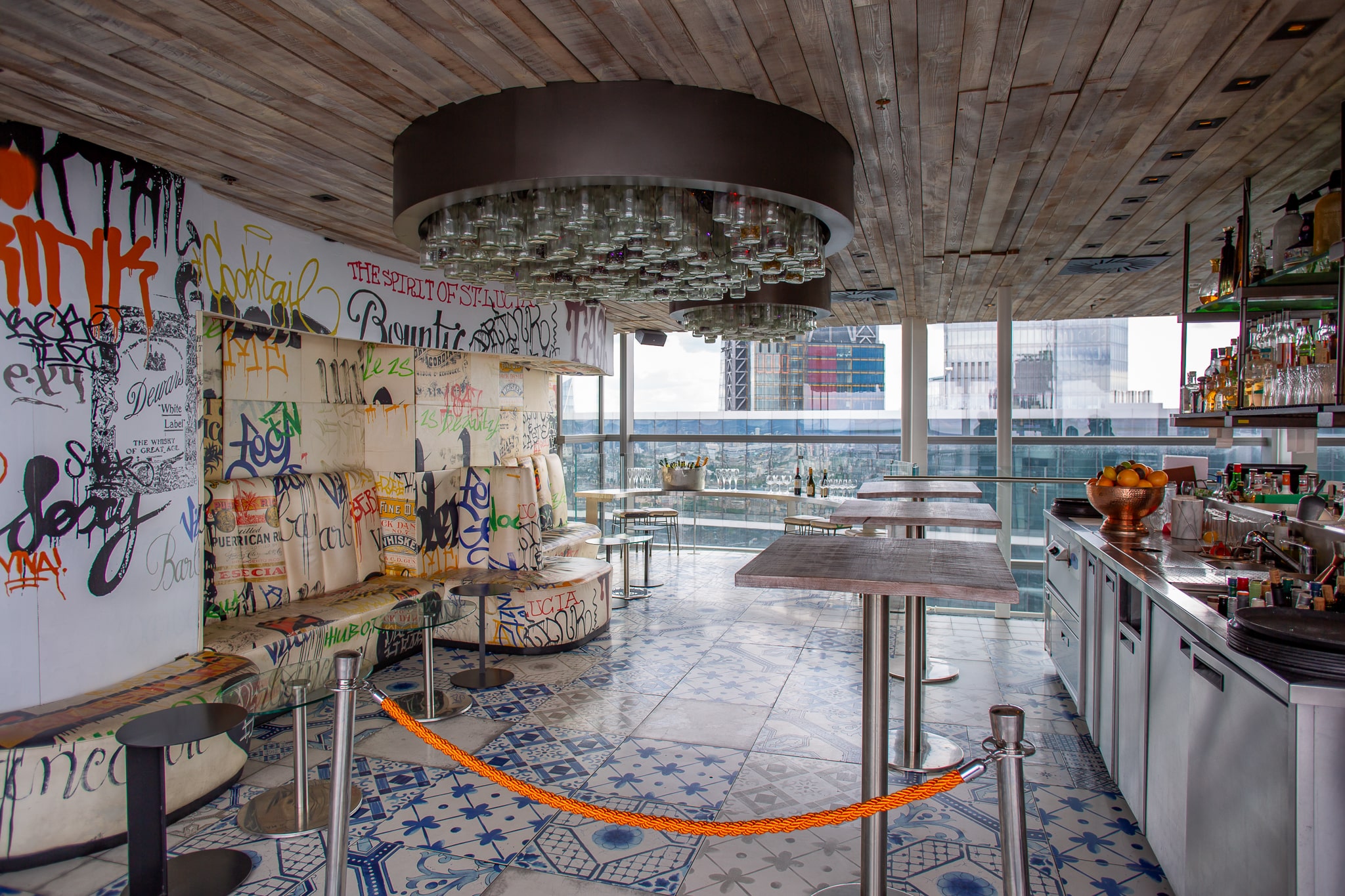 Semi-private bar events at Duck & Waffle, featuring a stylish rooftop with city views. - Banner