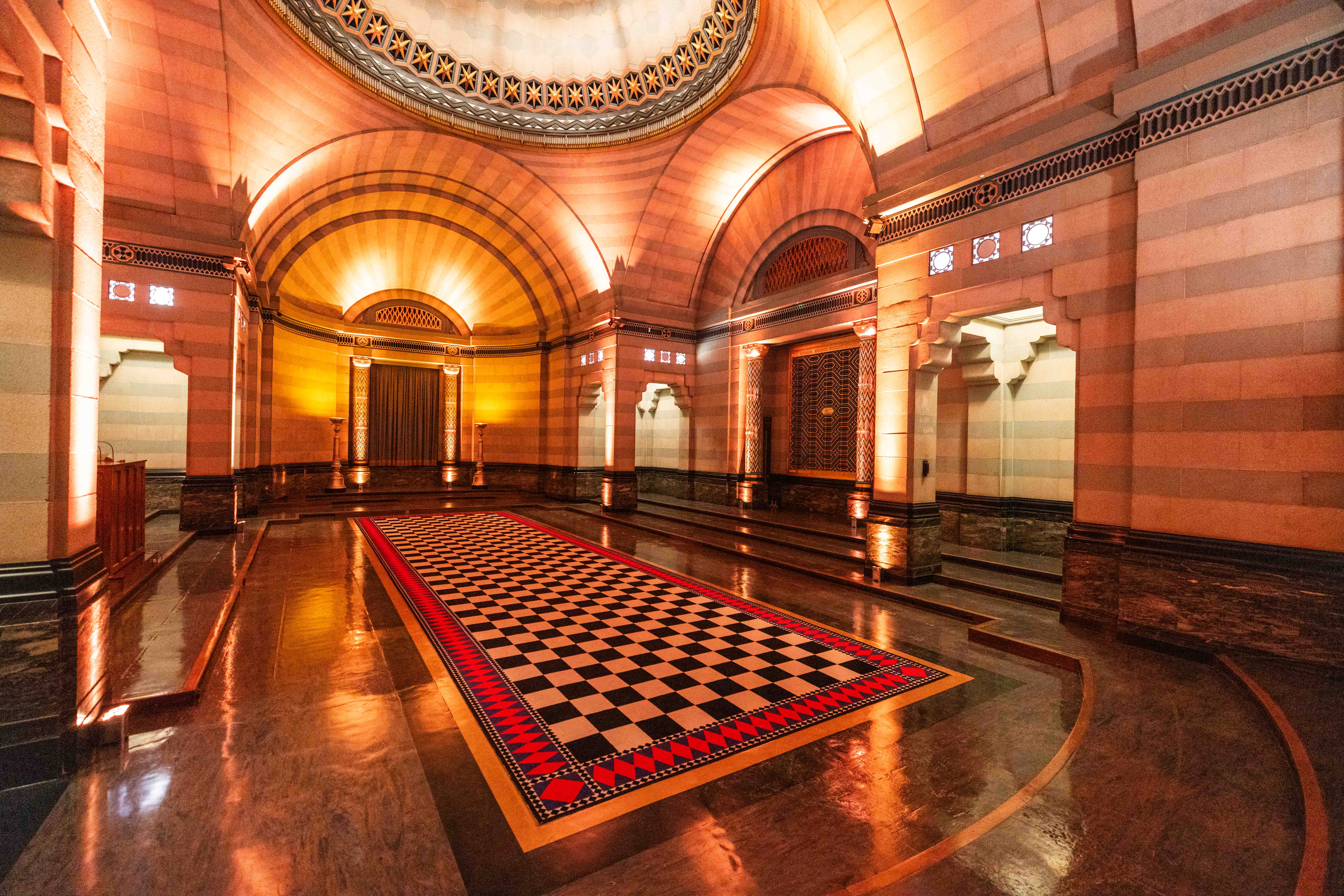 Opulent Egyptian Room event space with grand architecture for upscale events. - Banner