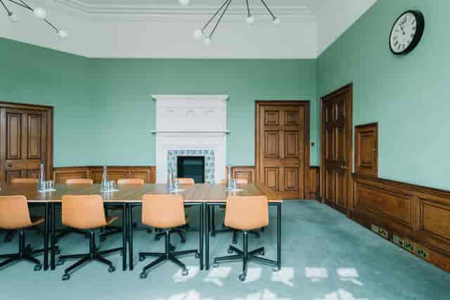 Bonar Law meeting room at Ashridge House, featuring a large table and ergonomic chairs.