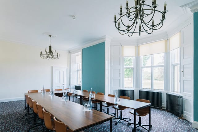 Elegant meeting room at Ashridge House, ideal for workshops and professional gatherings.