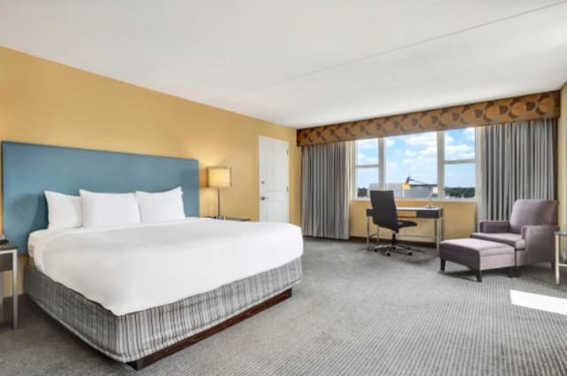 Business hotel room at The Heldrich with workstation for corporate travel and bleisure stays.