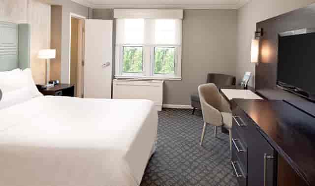 Westin Governor Morris hotel room with workspace for business travel and event room blocks.