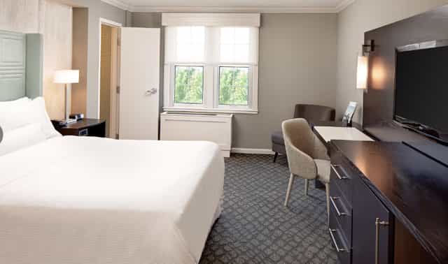 Westin Governor Morris hotel room with workspace for business travel and event room blocks.