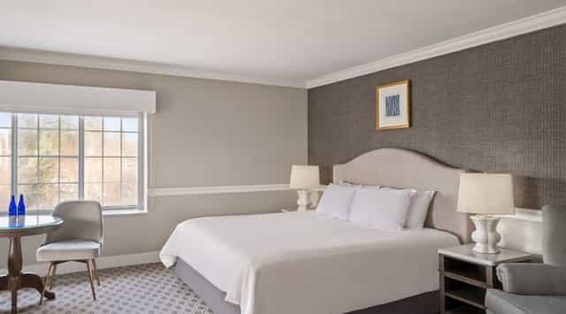 Modern hotel room at The Madison Hotel, ideal for meetings and corporate events.