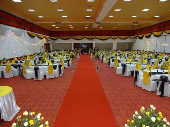 Blue Pearl Hotel ballroom with red carpet runner for weddings and gala dinners.