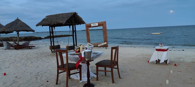 Romantic beach dining at Gilmans Hall, White Sands Resort for intimate events and luxury weddings.