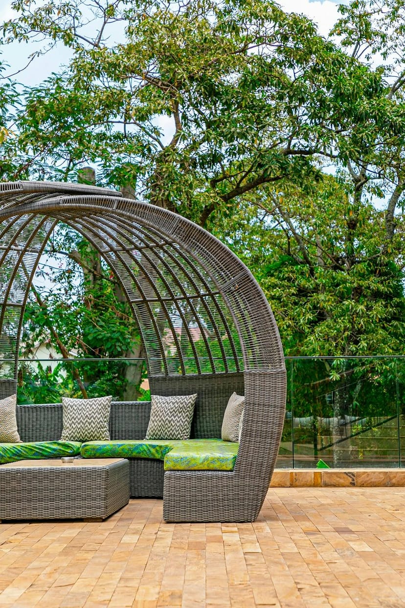 Gran Meliá Arusha outdoor wicker pod for professional networking and corporate breakout events.