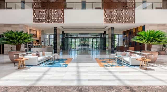 Elegant Gran Meliá Arusha banqueting suite, perfect for luxury event registration and networking.