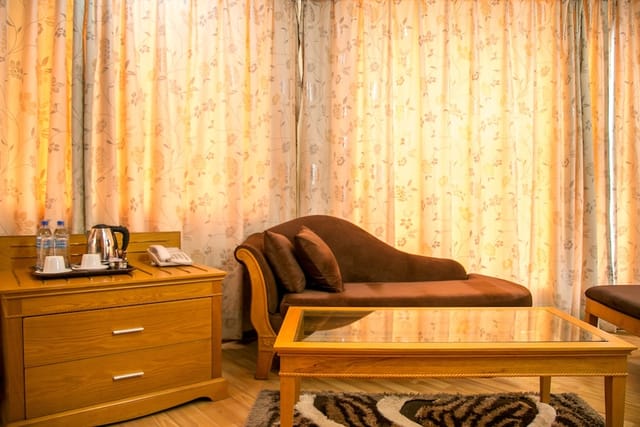 Kebby's Hotel VIP breakout room with chaise lounge for corporate events and meetings.