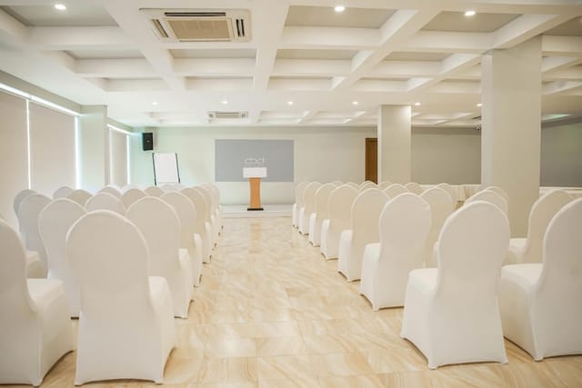 Theater-style meeting room in CBD hotel for professional seminars and corporate events.