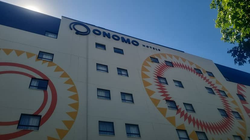 Modern Onomo Hotel Le Studio facade for creative corporate retreats and boutique offsites.