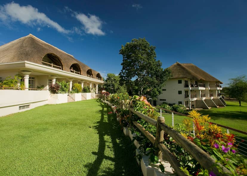 Ilala Lodge terrace with expansive lawn for corporate incentive travel and gala events.