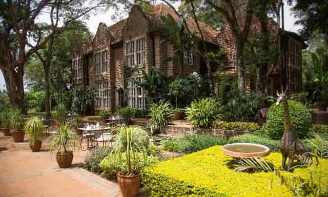 Orchid House at Giraffe Manor: historic garden venue for corporate retreats and social gatherings.