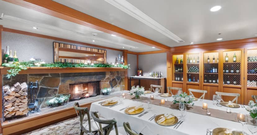 Wine cellar private dining room at Salish Lodge with fireplace for professional events.