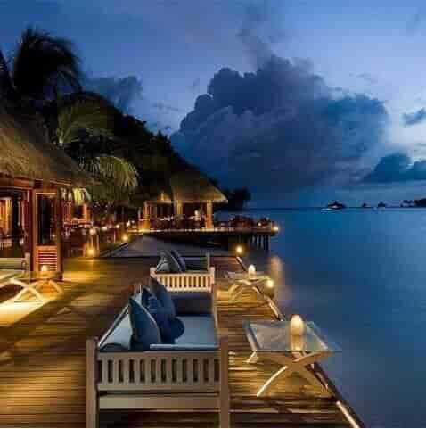 Luxury incentive event setup on Baraza Resort beach under ambient lighting, Zanzibar.