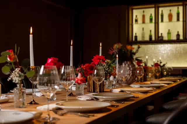 Private dining room with floral decor for executive dinners and corporate retreats.