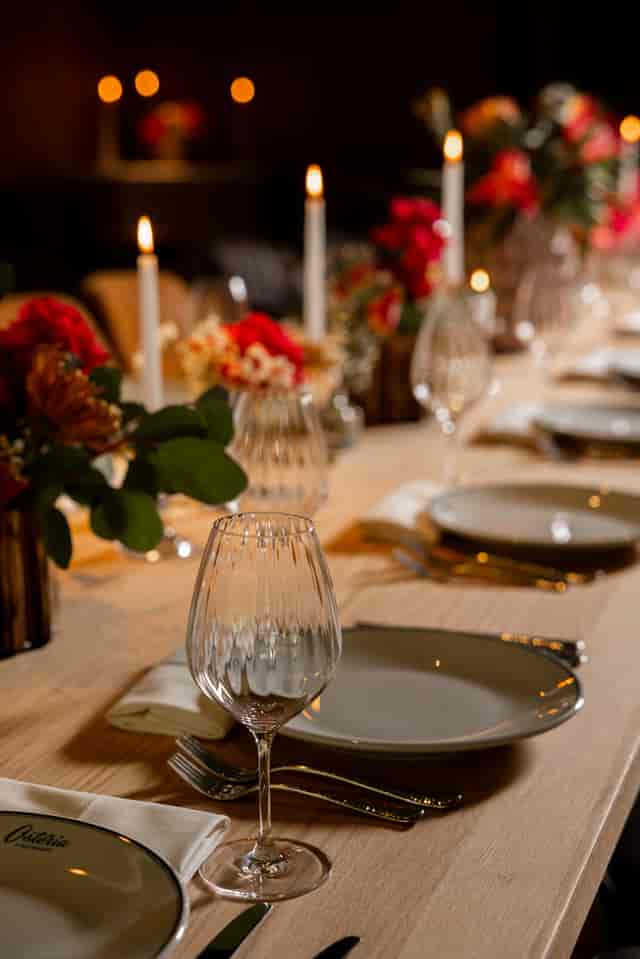 Elegant private dining room with floral accents for intimate gala dinner events.