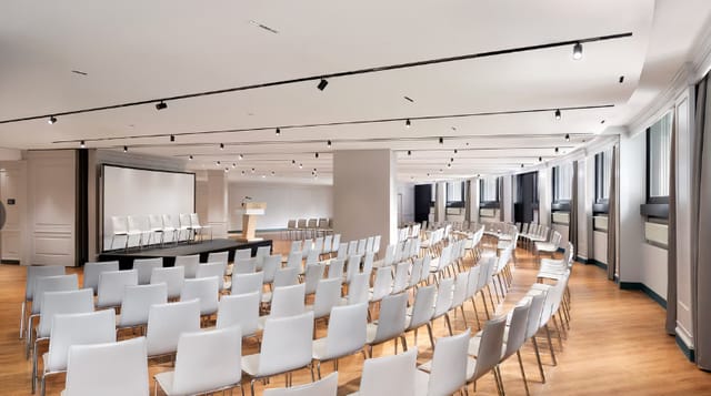 Faggio C Room conference hall in theatre setup for corporate seminars and professional events.