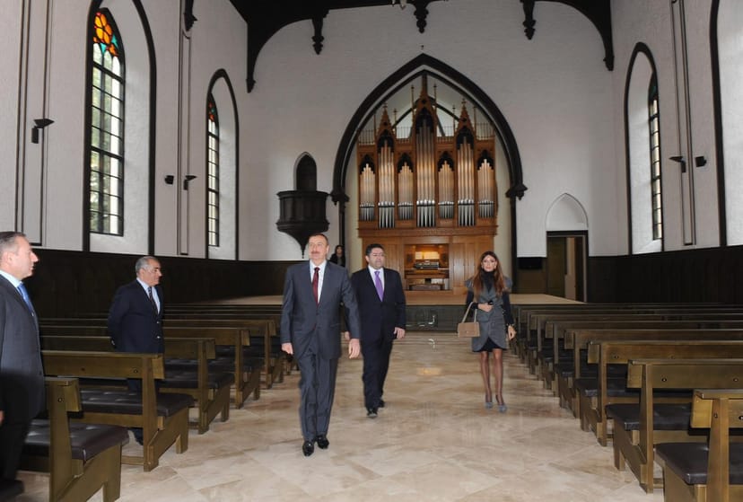 Main Hall at KAPELLHAUS with historic pipe organ for corporate events and venue site inspections.