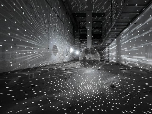 Industrial event space at Kapellhaus with atmospheric lighting for immersive corporate conferences.