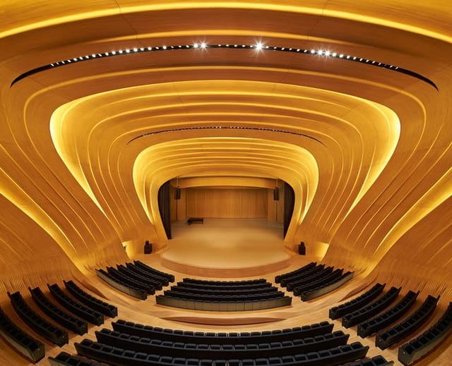 Heydar Aliyev Center auditorium with organic architecture for keynote presentations and gala events.