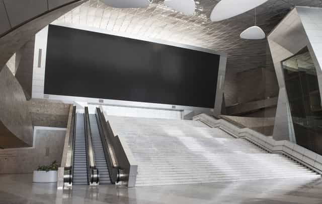 Baku Convention Center auditorium with grand digital screen for corporate events and conferences.