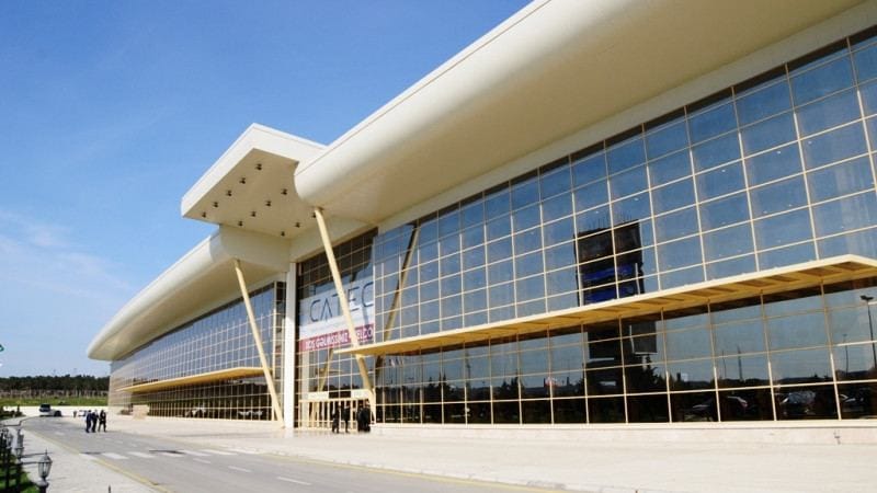 Modern Baku Expo Center featuring glass facade for trade shows and corporate exhibitions.
