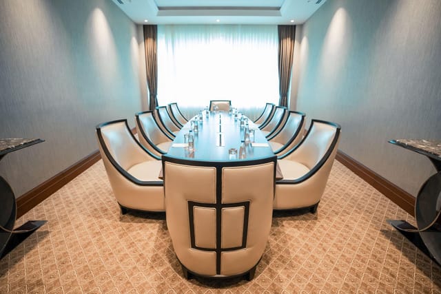 Boardroom setup at Fly Inn Baku Conference Hall for executive meetings and corporate strategy.