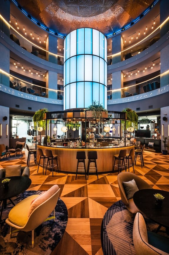 Circular bar in Courtyard Baku event space, ideal for luxury networking and corporate receptions.