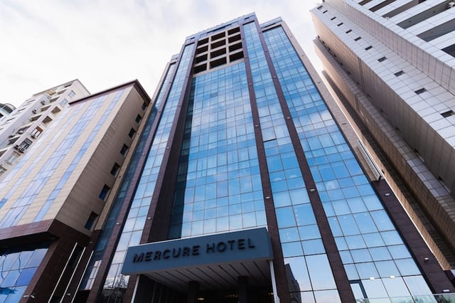 Modern Mercure Baku City hotel, high-rise exterior for corporate meetings and business travel.