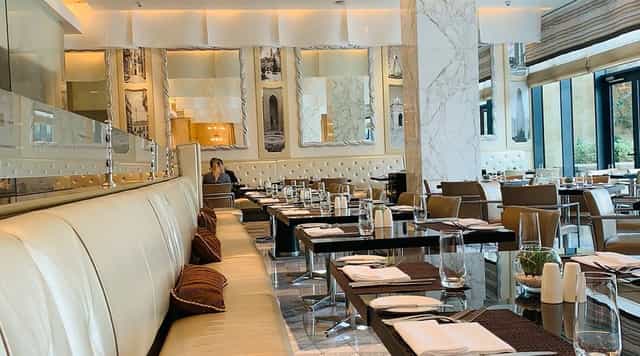 Modern hotel restaurant in Baku, elegant fine dining venue for corporate events and gala dinners.